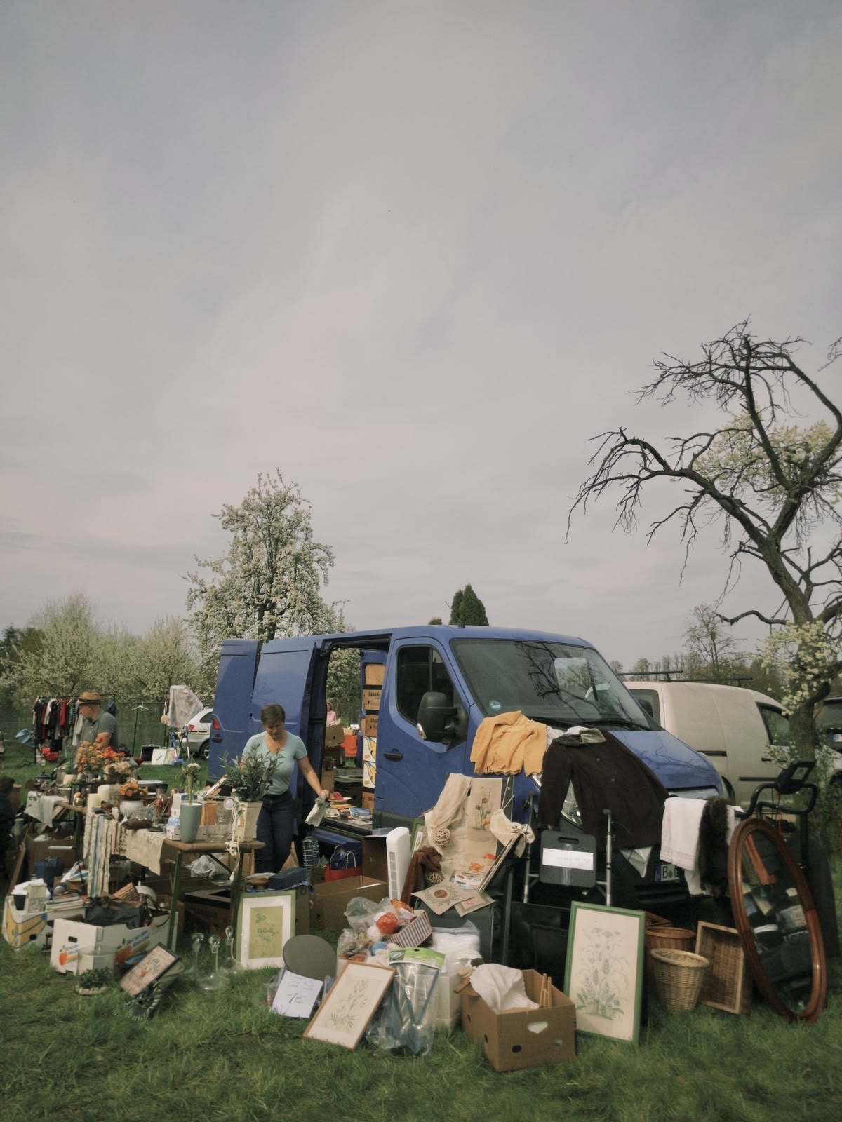 A flea-market style stall of secondhand goods being resold outdoors